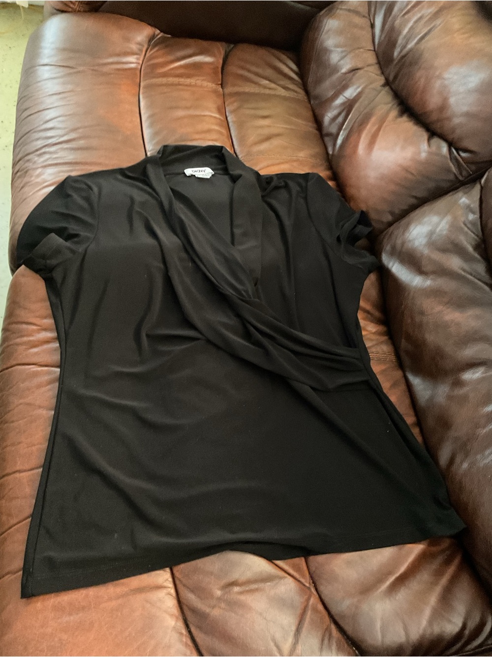 DKNY. Black faux wrap blouse